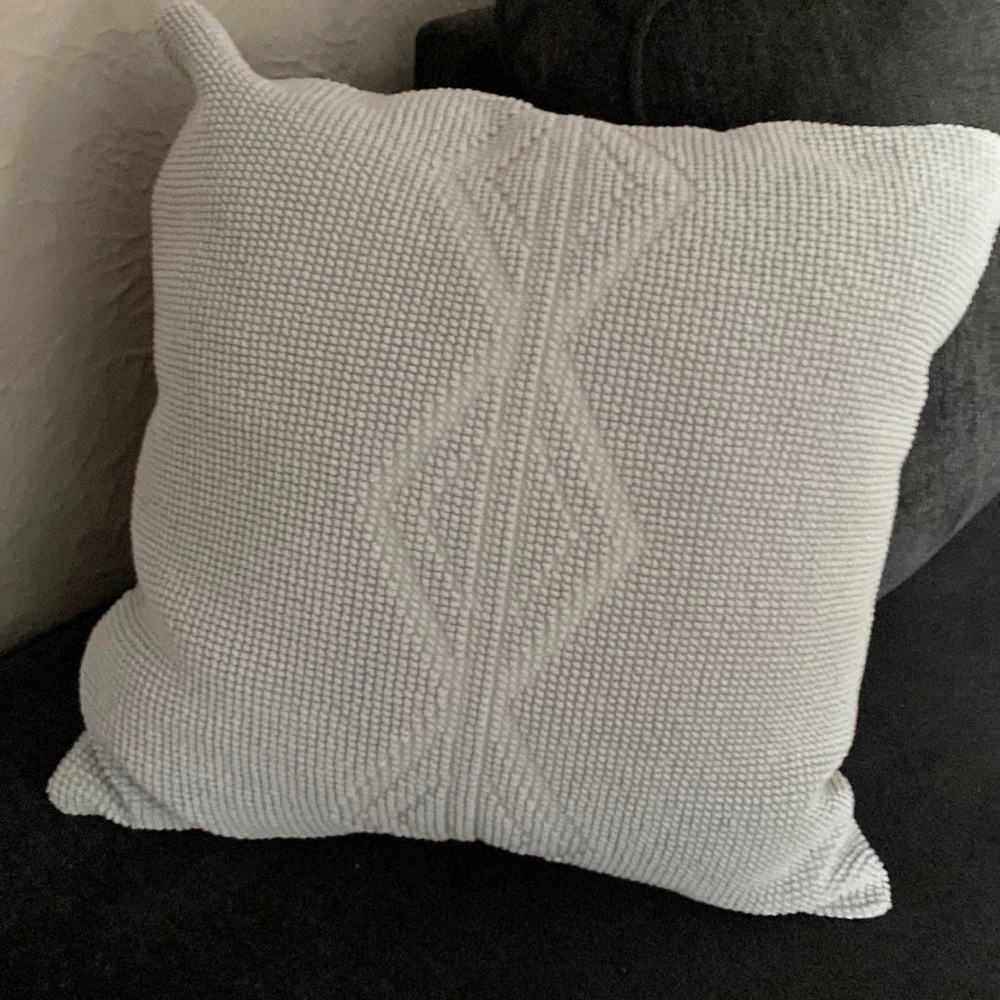 Textured accent pillow.